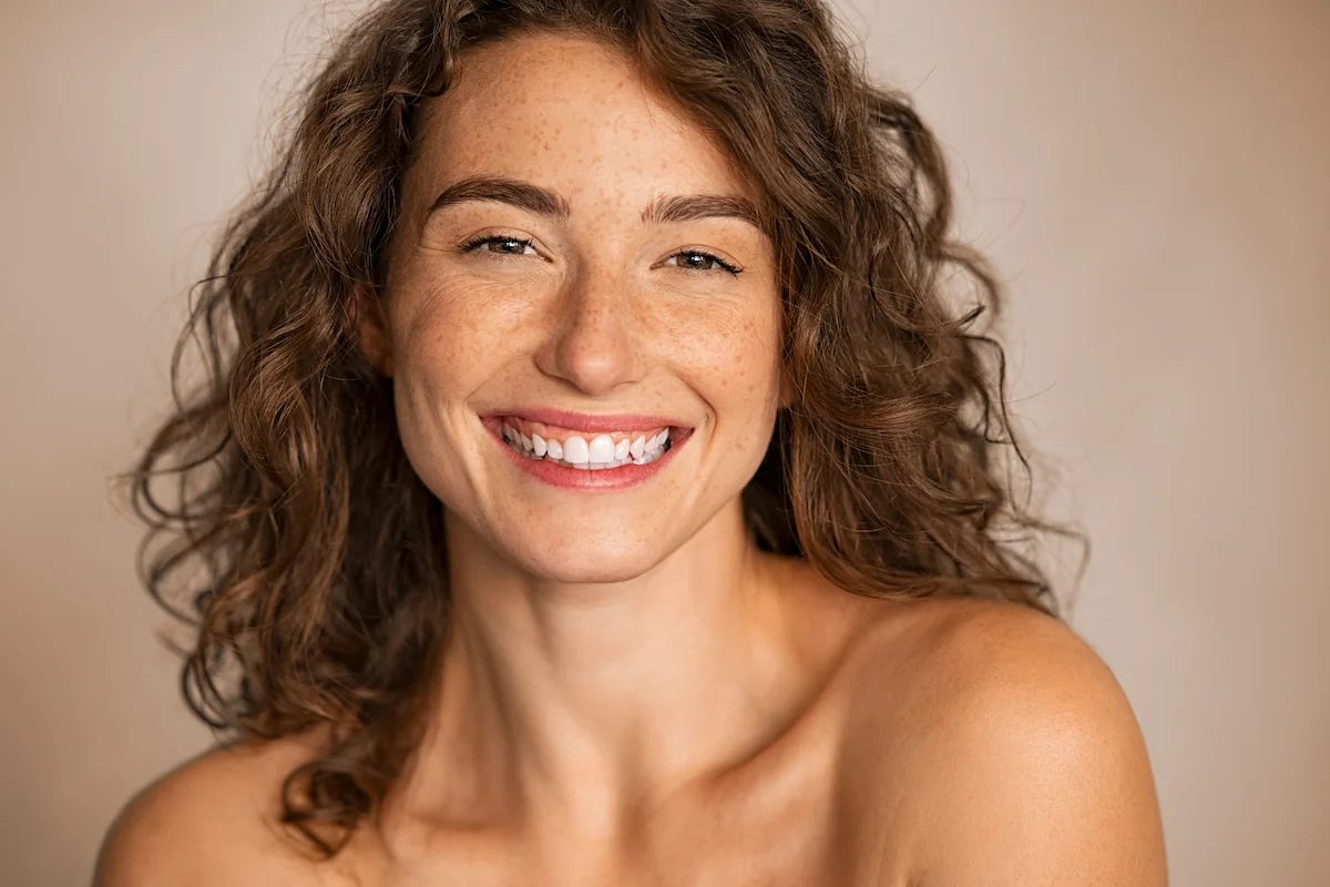 Smiling woman after DiamondGlow treatment